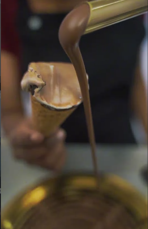 Chocolate flowing from Culinext equipment