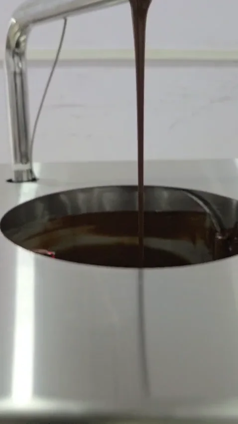 Tempered chocolate dispensing from a Culinext continuous tempering machine